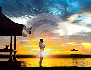 Yoga Meditation at Beach in Bali photo