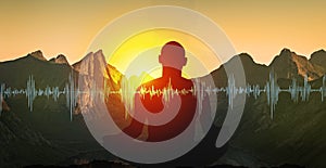 Yoga meditation illustration, silhouette of man practicing in mountains at sunset