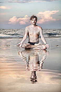 Yoga meditation near the ocean