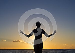 Yoga meditation at sunset. Helthy life and meditation concept.