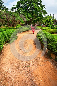 Yoga natarajasana dancer pose in Lalbagh garden photo