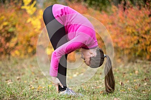 Yoga outdoors: uttanasana pose