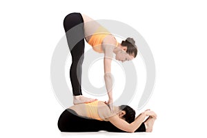 Yoga with partner, seated and standing forward bend