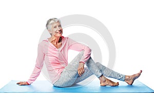 Yoga portrait, senior and woman in studio isolated on a white background. Zen chakra, pilates fitness and retired