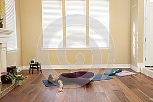 Yoga Pose Supine Twist right photo