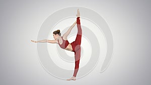 Yoga pose, woman doing stretching legs, leg split on gradient ba