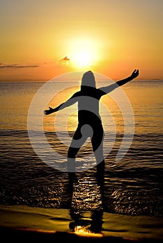 Yoga poses a tree in the sea