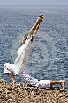 Yoga posture on the rocks