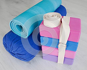 Yoga props blocks, strap, roller and carpet