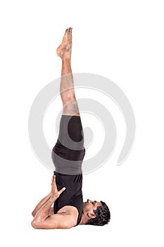 Yoga shoulder stand pose on white