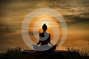 YOGA Silhouette woman sitting area meditating