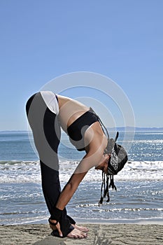 Yoga stretch on beach