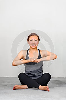 Yoga students showing different yoga poses