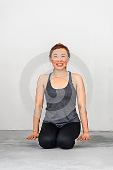 Yoga students showing different yoga poses