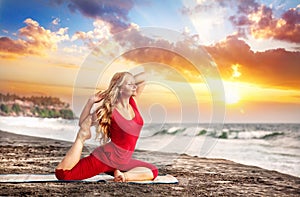 Yoga at sunset beach