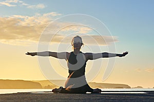 yoga at sunset pose looking at an attractive woman\'s camera