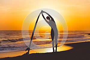 Yoga with surfboard