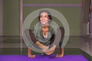 Yoga trainer demonstrating yoga positions