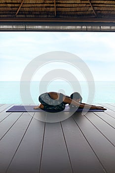 Yoga Training. Woman In Sport Clothes Stretching Body Near Sea