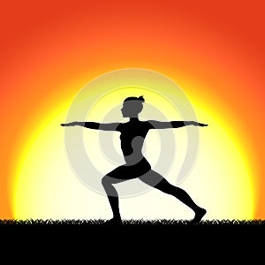 Yoga virabhadraasana pose black silhouette on sunset background. Woman character meditating in nature.