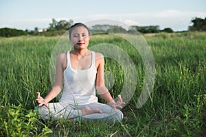 Yoga woman In the lotus posture.