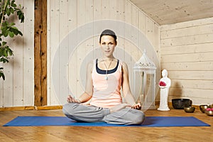 Yoga woman siddhasana photo