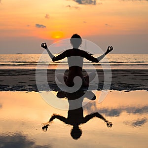 Yoga woman sitting in lotus pose