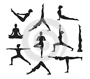 Yoga Workout. Silhouettes of a woman in Yoga Asanas