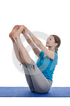 Yoga - young beautiful woman doing asana excerise photo