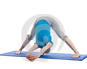 Yoga - young beautiful woman doing yoga asana excerise isolated