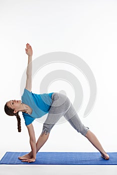 Yoga - young beautiful woman doing yoga asana excerise isolated