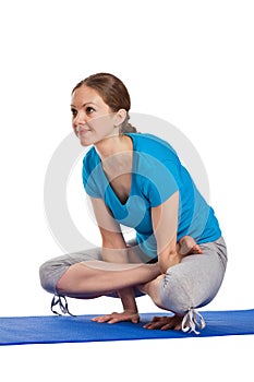 Yoga - young beautiful woman doing yoga asana excerise isolated