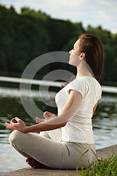 Yoga young woman doing exercises.