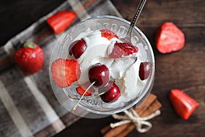 Yoghurt with fresh strawberries and cherries