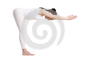 Yogi female standing in Ardha Uttanasana pose