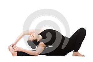 Yogi female in yoga Head-to-Knee Forward Bend Pose