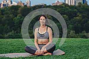 Yogi girl taking break after workout.