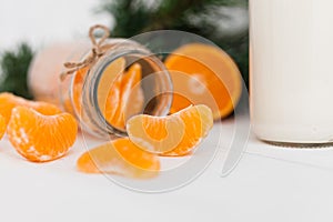 Yogurt with fresh orange slices and whole oranges