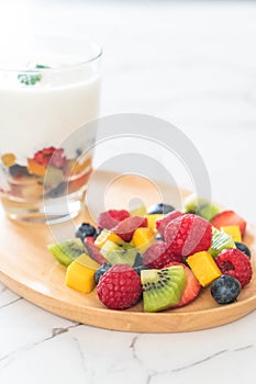 yogurt with mixed fruit (strawberry, blueberries, raspberry, kiwi, mango