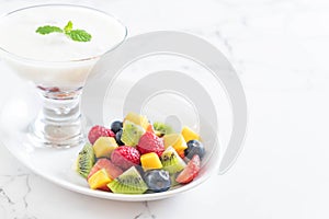 yogurt with mixed fruit (strawberry, blueberries, raspberry, kiwi, mango