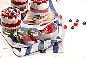 Yogurt parfafait with granola and berries. Sweet and healhty breakfast dessert, Yogurt, blueberries and raspberries