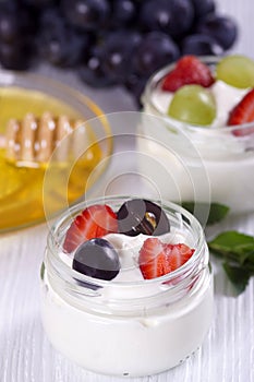 Yogurt with strawberries and grapes
