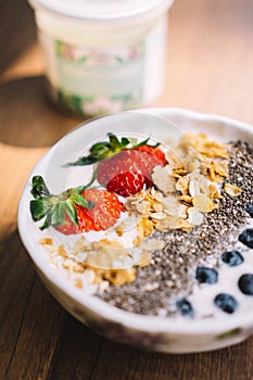 Yogurt with strawberry, blueberry, chia seed and cornflake