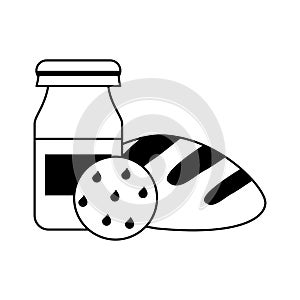 Yogurth bottle with cookie and bread in black and white photo