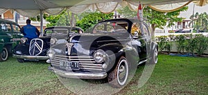 Yogyakarta Indonesia November 22 2020 black Peugeot 203 in a classic car meet