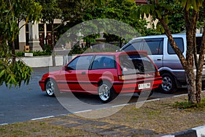 Red Honda Civic wonder sb3 on Black Auto Battle Yogyakarta 2023 parking lot