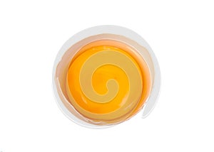 Yolk in broken egg isolated on white background.