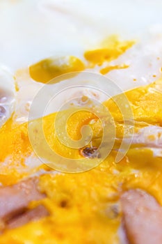 the yolk and white scrambled eggs , top view