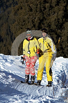 Yong family skiers rise on ski lift