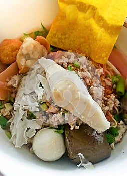 Yong Tau Foo : Thai-Hakka style noodle with with fishballs and red sauce. Thai Style Noodle with assorted tofu, crispy wonton.